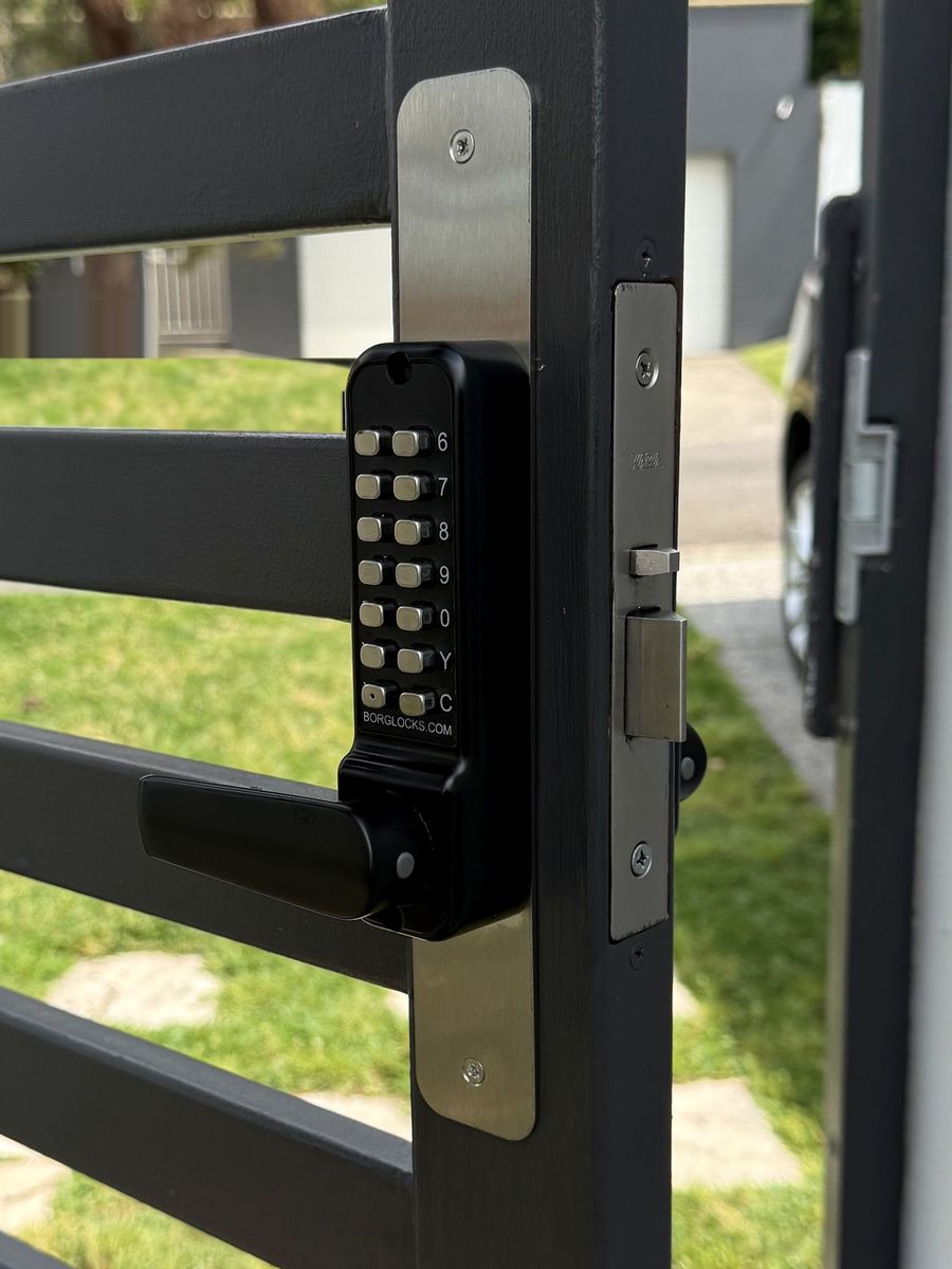 New keypad lock fitted to a front gate